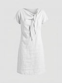 Beatrice cap sleeve bow detail mini dress in white, front view showing bow-knot neckline on white crisp-touch woven fabric.