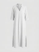 Beatrice linen-look maxi dress in white, front view showing mandarin stand collar, notched V-neckline, cuffed three-quarter sleeves, and side slits.