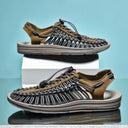 Carter sandals with tan leather upper, black and gray striped webbing, lace-up closure, and gray sole, shown from side angles.