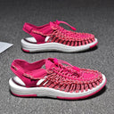 Bright pink woven sandals with white sole and ankle strap, shown in front and side views.