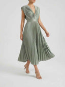 Charlotte Pleated V-Neck Midi Dress in Grey Green — wide waistband and all-over knife-pleated bodice, close angled front view.