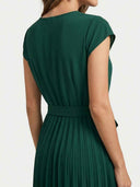 Clara dark green cap sleeve pleated midi dress, back view showing full accordion-pleated A-line skirt and self-tie waist detail — occasion dress in dark green.