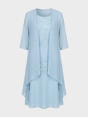 Daisy sky blue midi dress with tonal floral appliqué bodice and open chiffon-feel jacket, front view.