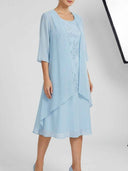 Sky blue floral embroidered midi dress with matching 3/4-sleeve chiffon jacket, front view — Daisy by Credo Nera.