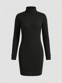 Daisy ribbed turtleneck long sleeve mini knit dress in black, bodycon fit, front view on grey background.