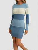 Blue and white striped knit mini dress with long sleeves and crew neck, front view.