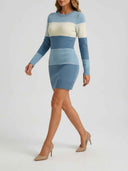 Blue and white striped knit mini dress, angled side view on a white background.