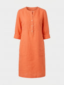 Daisy 3/4 sleeve relaxed shift dress in orange woven, round crew neck, partial button placket, roll-tab sleeves and two front patch pockets, front view.
