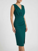 Teal-green sleeveless V-neck ruched bodycon midi dress with side slit, angled view on white background.