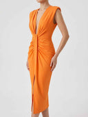 Orange midi dress with deep V-neck, ruched front, and side slit, angled view.
