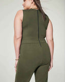 Olive green sleeveless jumpsuit with black back zipper, angled back view.