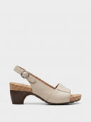 Beige cork platform block heel slingback sandal with peep toe and silver buckle, side view on white background.