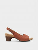 Brown cork platform block heel slingback sandal with peep toe and buckle strap, side view on white background.