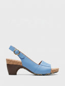 Sky blue cork platform block heel slingback sandal with silver buckle and open toe, side view on white background.