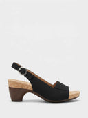 Black cork platform block heel slingback sandal with peep toe and silver buckle strap, side view.