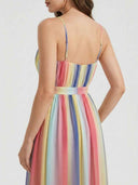 Delilah striped maxi dress showing thin spaghetti straps and back zip closure, rear view on white background.