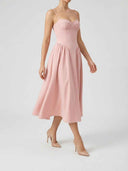 Delilah blush pink sweetheart midi dress with spaghetti straps and sweetheart neckline, angled view on white background.