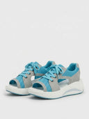 Pair of blue and grey open-toe platform sandals with breathable mesh panels and white rocker-curve sole, white background.