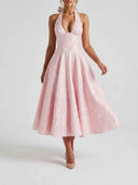 Pink floral jacquard halterneck midi dress with full skirt, front view.