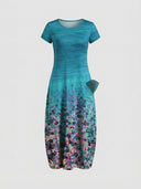 Teal mini dress with short sleeves, floral print on skirt, and side pocket, front view on gray background.