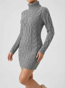 Gray cable knit mini dress with turtleneck, angled front view on white background.