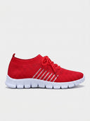 Red mesh lace-up trainer with white sole and diagonal reflective stripe, side view on white background.