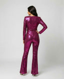 Magenta sequin jumpsuit with long sleeves and flared legs, back view on a white background.