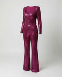 Magenta sequined jumpsuit with long sleeves, square neckline, and belt, angled front view.