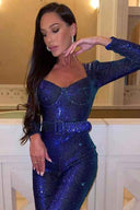 Blue sequin jumpsuit with long sleeves and matching belt, angled front view.