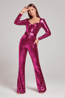 Fuchsia sequin jumpsuit with long sleeves, square neckline, and belted waist, front view.