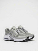 Women's grey air cushion chunky trainers - side profile showing breathable mesh upper, padded collar, and black rubber outsole.