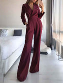 Maroon slim-fit long sleeve jumpsuit with lapel collar and wide legs, front view in a bright room.