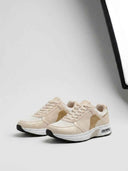 Air cushion lace-up trainers in beige — side profile showing white midsole with visible heel air-cushion window and black rubber outsole.