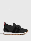 Black knit lace-up barefoot trainer with suede side panels, white EVA midsole, and gum outsole, side profile view.