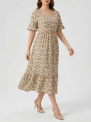 Yellow floral midi dress with V-neck, ruffled sleeves, and tiered hem, angled view.