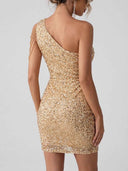 Gold sequin one-shoulder mini dress with shoulder chain detail, angled back view.