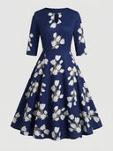 Navy blue maxi dress with white floral print, keyhole neckline, and elbow sleeves, front view.