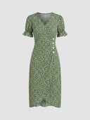 Green floral mini dress with puff sleeves, V-neck, and white buttons, front view on white background.