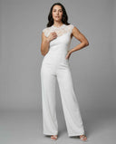 White jumpsuit with lace yoke and wide legs, front view on gray background.