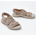Beige closed toe cushioned walking sandals with woven lattice upper and flat cushioned sole, front and side angles.