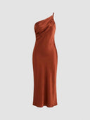 Rust one-shoulder bodycon midi dress with draped neckline, front view on a white background.
