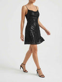 Black sequin mini dress with spaghetti straps, side view on a white background.