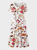White mini dress with short sleeves and colorful floral print, front view.