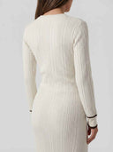 Cream ribbed mini dress with long sleeves and brown cuffs, back view.