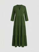 Olive green tiered maxi dress with V-neck and three-quarter sleeves, front view on white background.