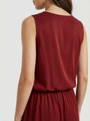 Red sleeveless maxi dress with elastic waist, back view.