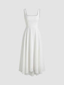White square neck A-line mini dress with thin straps, front view on a light gray background.