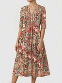 Red floral midi dress with V-neck and elbow sleeves, front view.