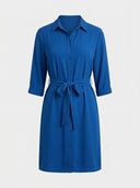 Blue mini shirt dress with long sleeves, collar, and waist tie, front view.