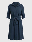 Navy blue mini shirt dress with rolled sleeves, tie waist, and pockets, front view.